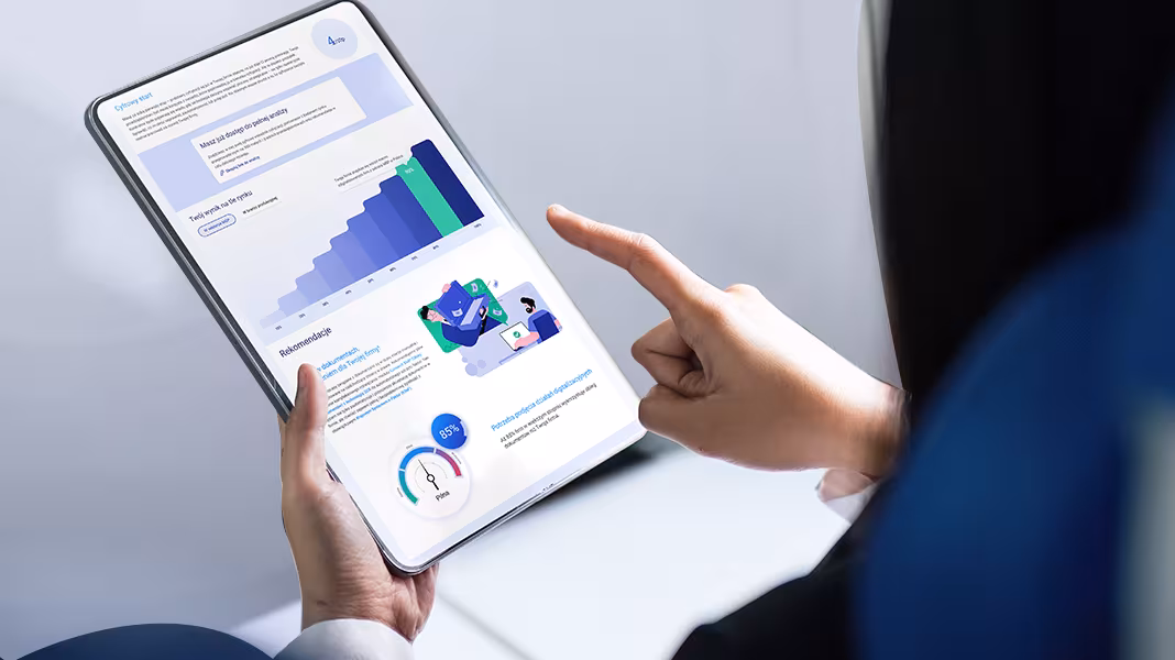 Tablet z wykresami i danymi