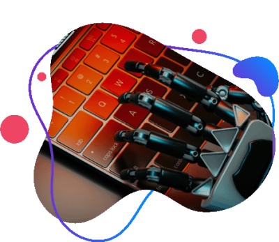 Robotyczna dłoń pisząca na&nbsp;klawiaturze laptopa podświetlonej na&nbsp;pomarańczowo.